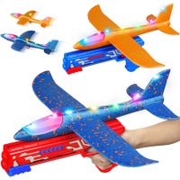 2 Pack Throwing Airplane Toys with LED Light, Foam Throwing Catapult Plane, Kids Outdoor Flying Games