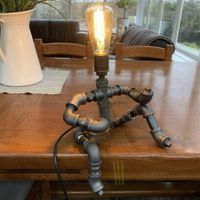 Steampunk Table Lamp: Unique Guitar-Playing Robot Design for a Retro Touch