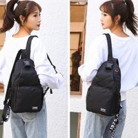 Crossbody Sling Backpack: Versatile Daypack for Men & Women with Earphone Hole