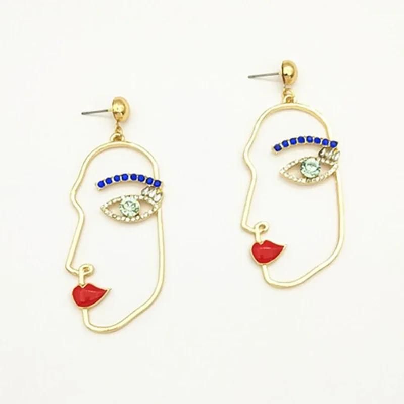 Unique Blue Crystal Human Face Earrings