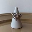 Hollowed Out Toggle Clasp Twisted Rings