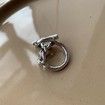 Hollowed Out Toggle Clasp Twisted Rings